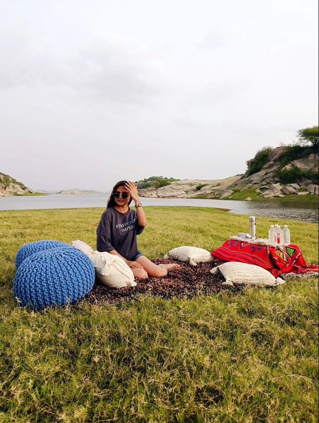 Guest lounging by the water at Jawai Bandh
