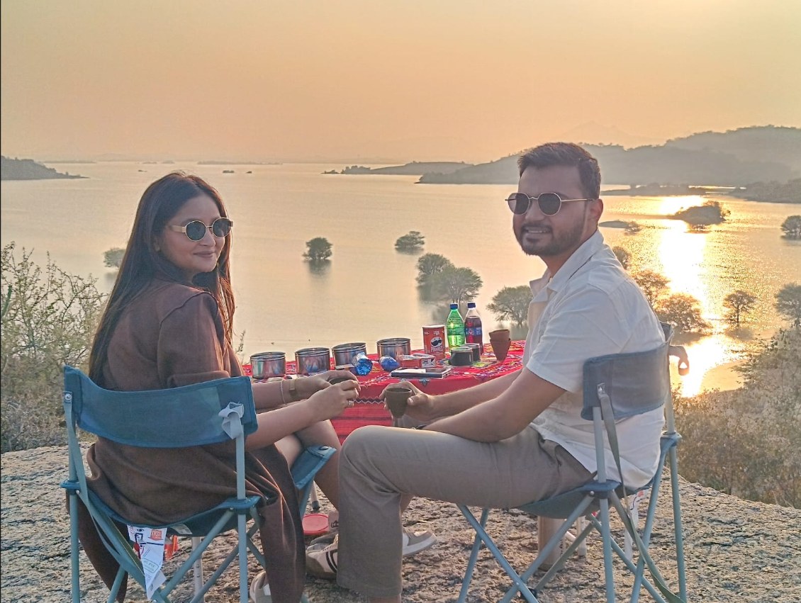 Golden-hour seating overlooking Jawai's reservoir